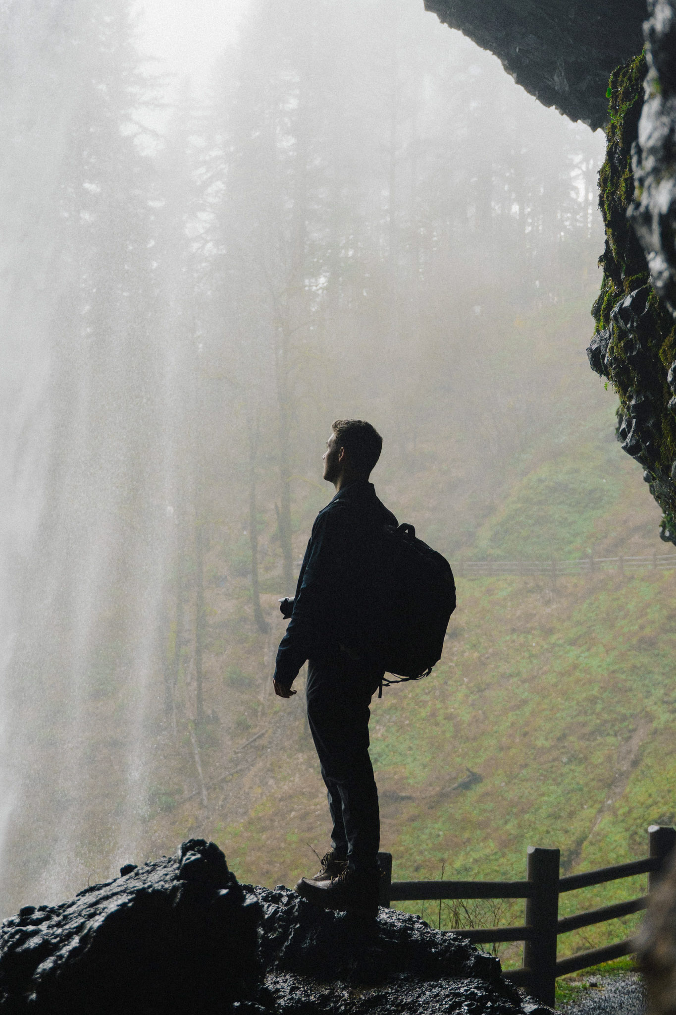 picture of benji standing under a waterfall